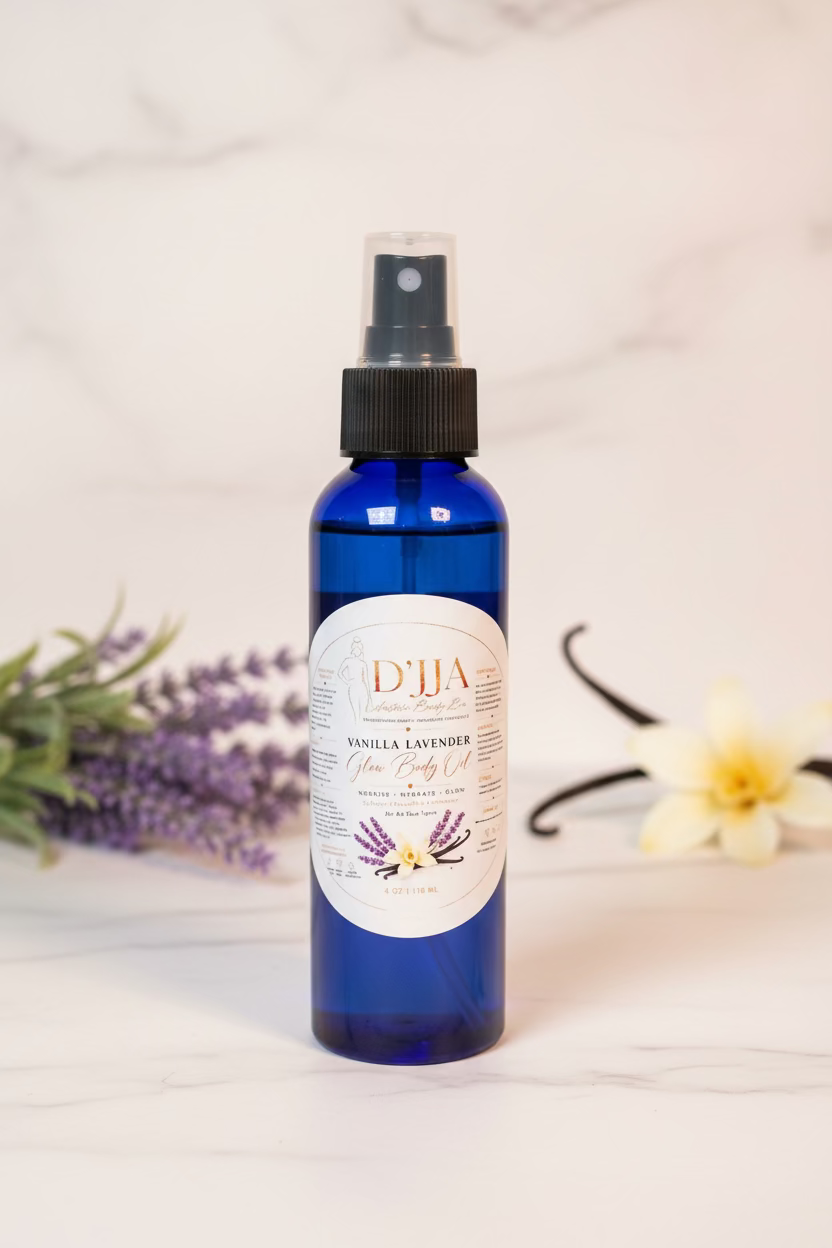 Blue bottle with black spray nozzle labeled 'D'Jia Vanilla Lavender' on a white surface with greenery in the background.